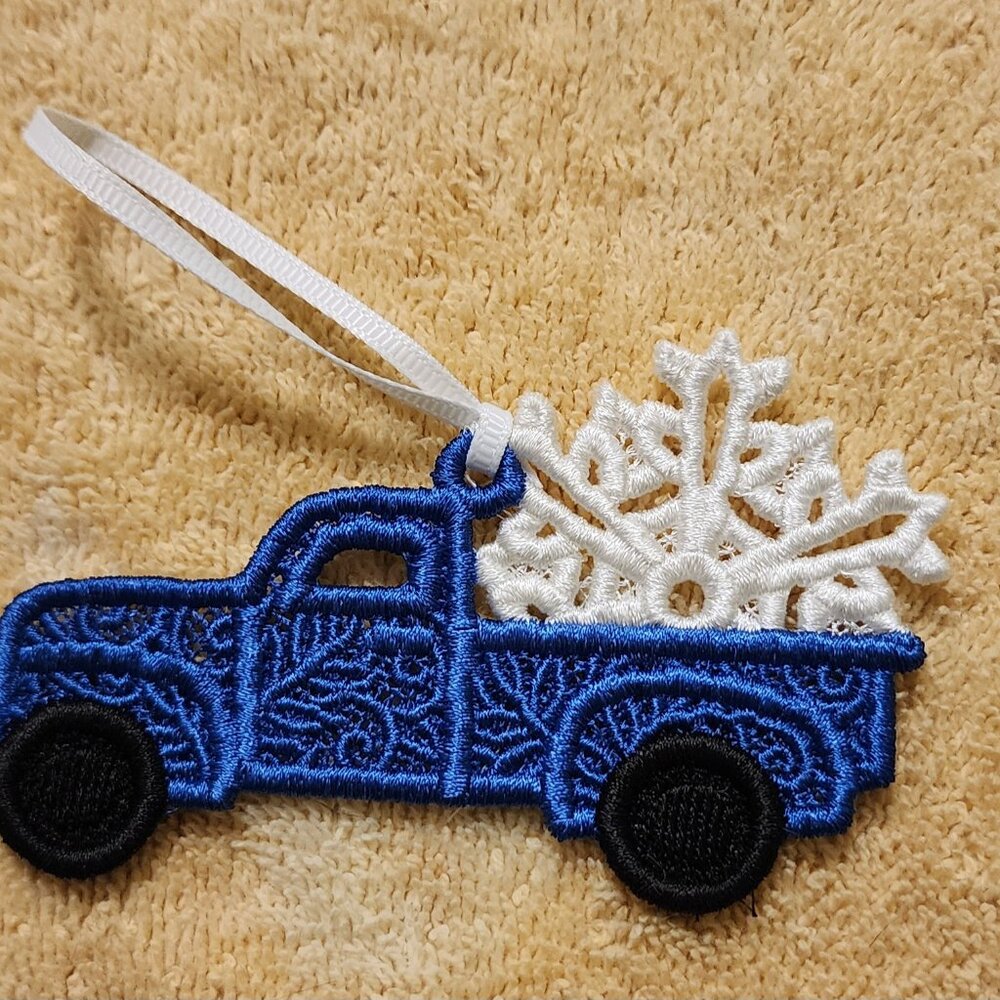 Blue truck with white snowflake Christmas ornament